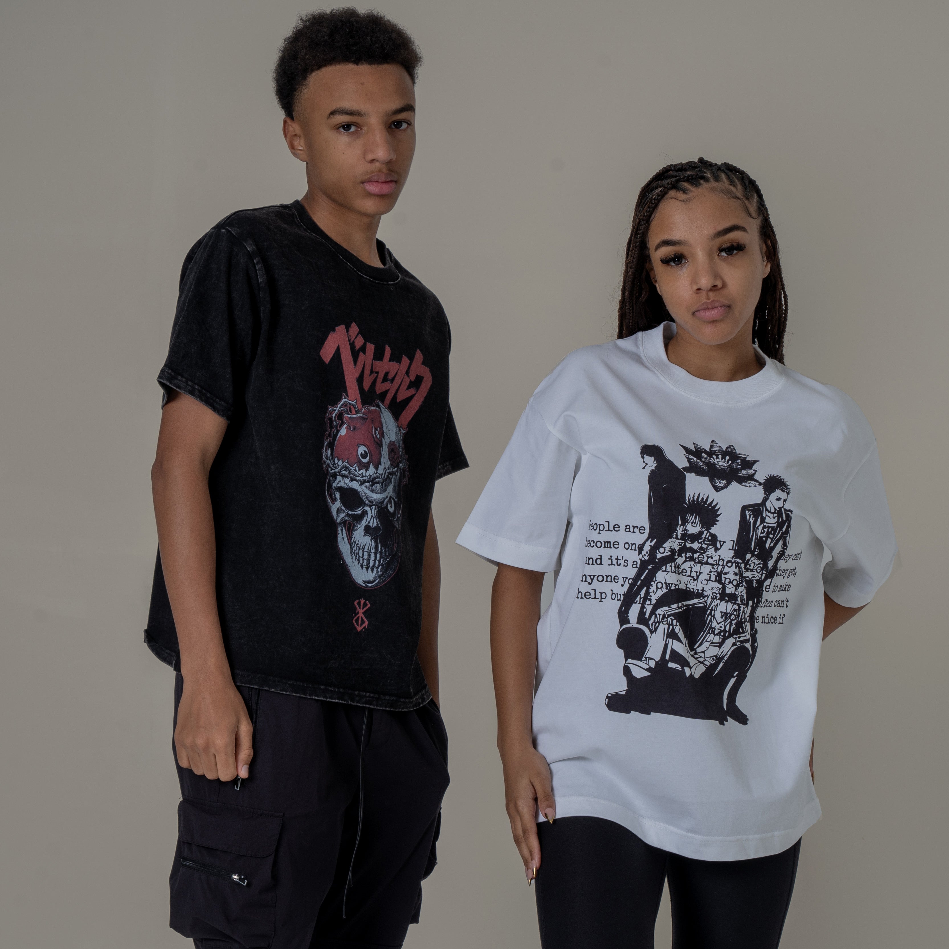 Two models wearing NANA & Berserk series T shirt in a photoshoot studio