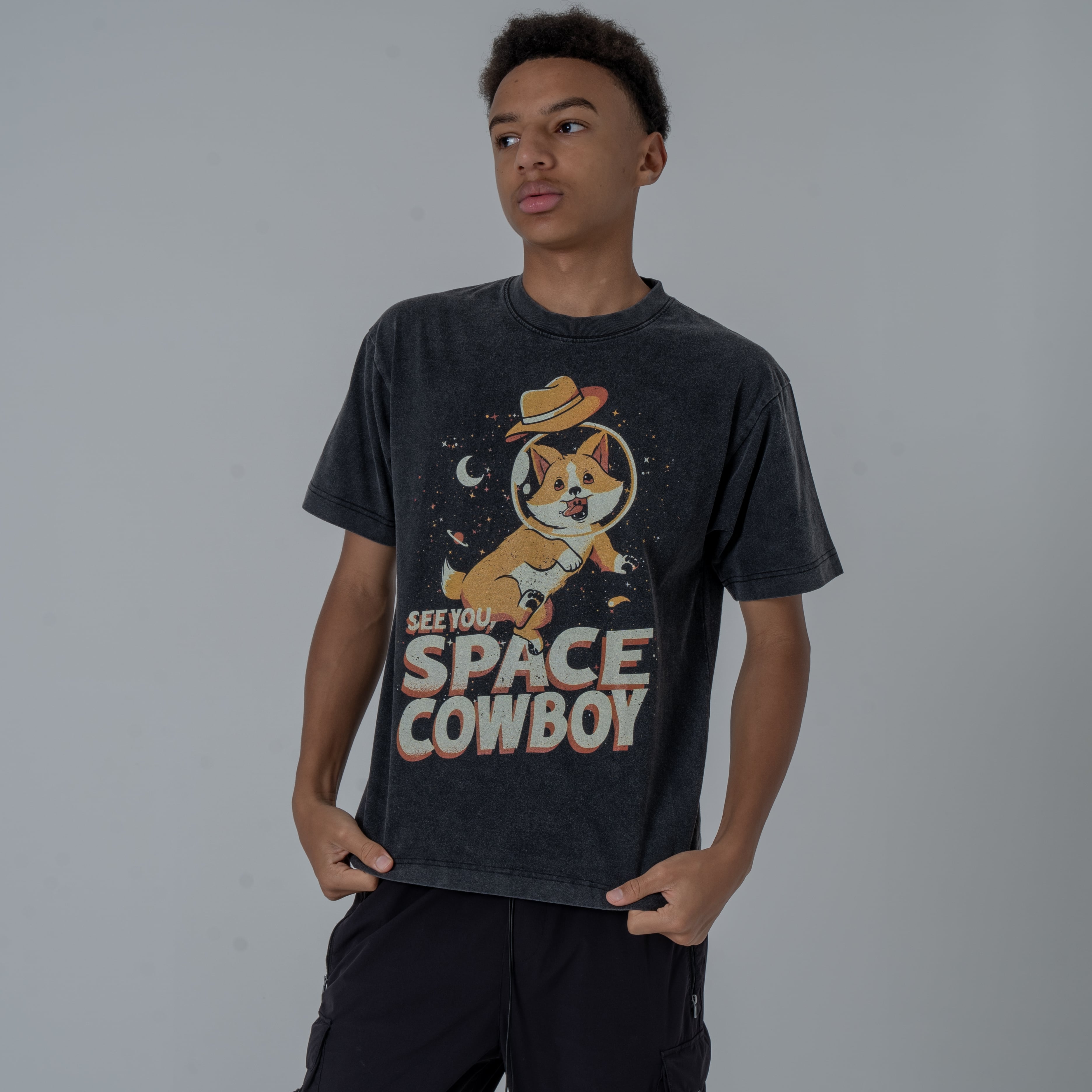 Half Body Shot of a Male Model Wearing Black Vintage Washed Shirt Featuring Ein From Cowboy Bebop Anime with See You Space Cowboy Text.